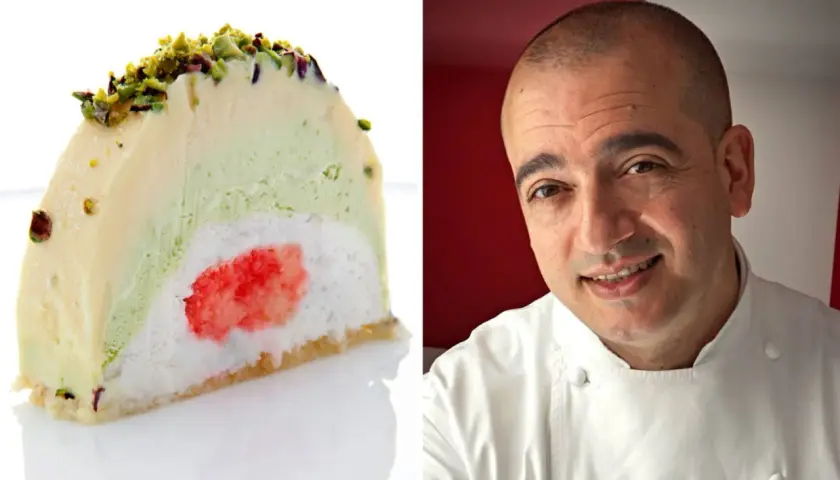 Una fetta di cassata siciliana gelato, con strati di gelato alla crema, pistacchio e un cuore rosso, accanto a un cuoco sorridente.